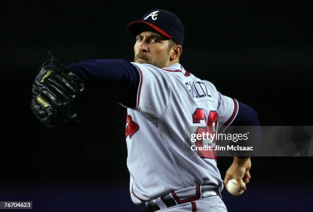 John Smoltz of the Atlanta Braves throws a pitch against the New York Mets during their game on September 12, 2007 at Shea Stadium in the Flushing...