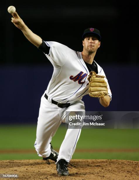 John Maine of the New York Mets pitches against the Atlanta Braves during their game on September 12, 2007 at Shea Stadium in the Flushing...