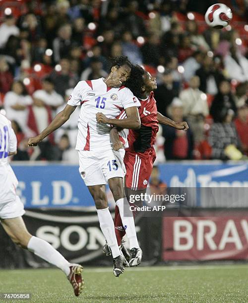Costa Rica's Junior Diaz and Canada's Julian De Guzman go for the header during their international friendly 12 September 2007 at BMO Field in...