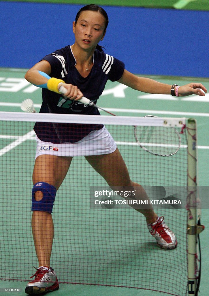 Pi Hongyan Pi Hongyan of France returns the shuttle toward Yao Jie of the... News ...