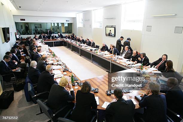 In this handout photograph provided by The FIA World Motor Sport Council, A general view of the Extraordinary World Motor Sport Council Hearing at...