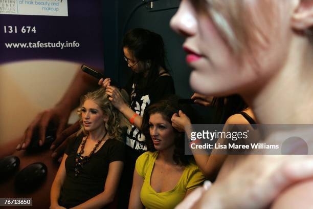 Contestants have hair and makeup applied backstage at Miss Earth Australia contest at the Enmore Theatre, September 13, 2007 in Sydney, Australia....