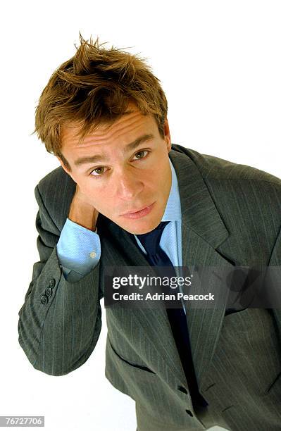 man in business attire - unhappy salesman stock pictures, royalty-free photos & images