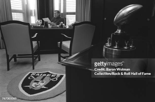 Oakland Raiders coach, Al Davis in his office, 1975. Davis was the principal owner and general manager of National Football League team, the Oakland...