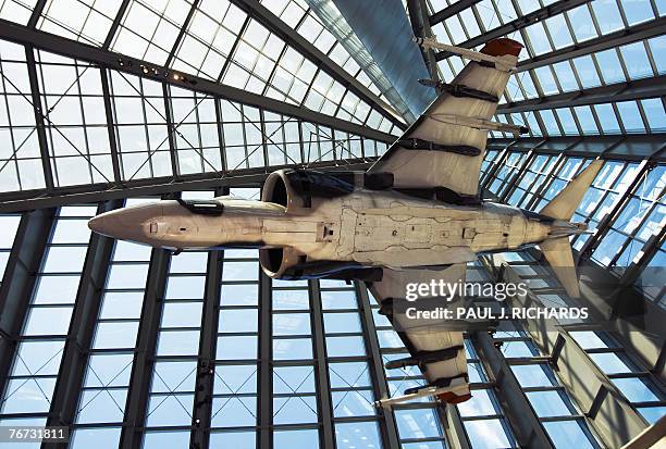 An US Marine Corps AV-8 Harrier jet is suspended and surrounded by glass at the National Museum of the Marine Corps 13 September 2007 in Triangle,...