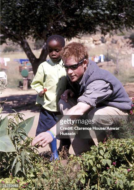 Undated Clarence House handout photo of Prince Harry with Mutsu at the Mants-Afe Children's Home, Mohales Hoek, Lesotho. Prince Harry has thanked the...