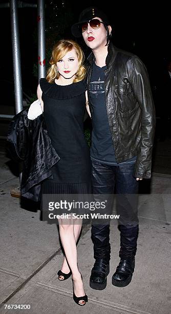 Actress Evan Rachel Wood and musician Marilyn Manson arrive for the after party for a special screening of "Across The Universe" at Bette on...