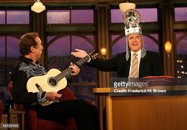 Actor Eric Idle and host Craig Ferguson talk during a segment of "The Late Late Show with Craig Ferguson" at CBS Television City on September 13,...