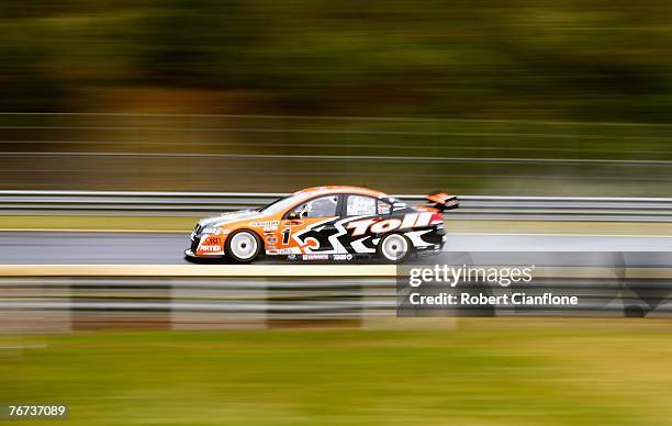 The Toll HSV Dealer Team Holden driven by Rick Kelly and Paul Radisich hits the back straight during practice for the Sandown 500 which is Round 9 of...