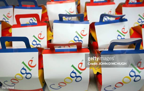 By Laurence Benhamou FILES - Picture taken 16 November 2005 shows Google bags at the opening of the GooglePlex, their new London office. Born 10...