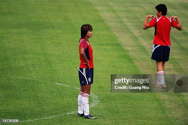 Han Duan and Ma Xiaoxu of China attend a training session for the Women's World Cup 2007 on September 14, 2007 in Wuhan, China.