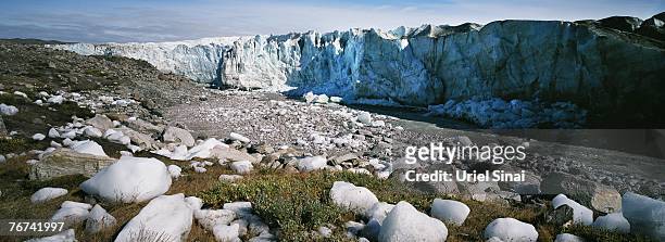 Ice boulders left behind under the Russell Glacier, after a flood caused by the overflowing of a lake, east of the town of Kangerlussuaq on September...