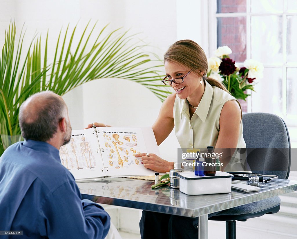 Man and woman in office