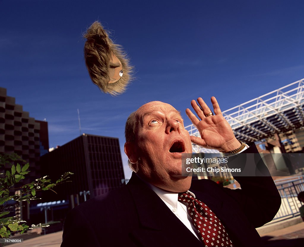 Man losing wig