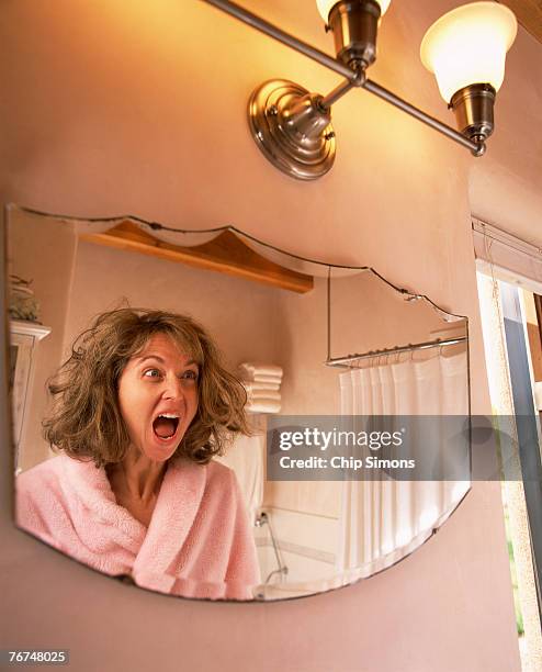 woman with messy hair - screaming stock pictures, royalty-free photos & images