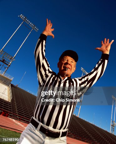 Referee making touchdown gesture Referee making touchdown gesture