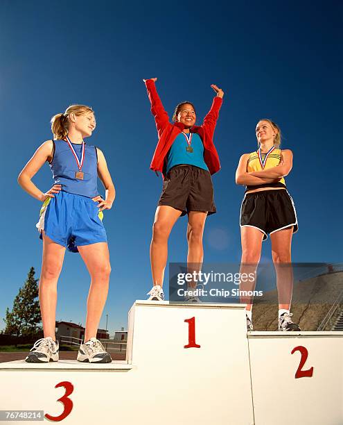 Runners Winning Female Athlete Winning Medal Photos and Premium High Res Pictures ...