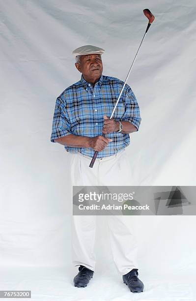senior man with golf club - golf driver stock pictures, royalty-free photos & images