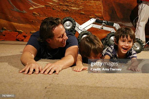 Steven Weber and sons Alfie Weber and Jack Weber experience the Rocker Bogie Suspension system rover at WIRED NextFest September 13, 2007 in Los...