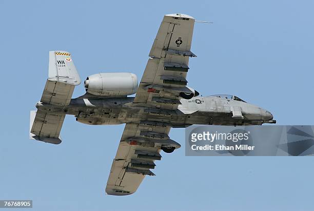 An A-10 Thunderbolt flies by during a U.S. Air Force firepower demonstration at the Nevada Test and Training Range September 14, 2007 near Indian...