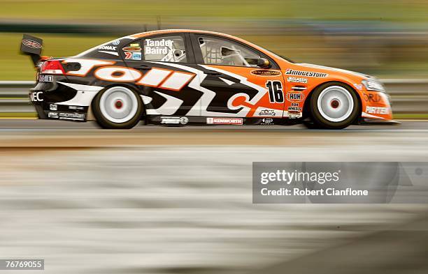 Garth Tander of the Toll HSV Dealer Team accelerates out of turn six during practice for the Sandown 500, Round 9 of the V8 Supercars Championship...