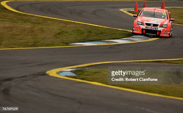 Nathan Pretty of the Holden Racing Team clips a curb during practice for the Sandown 500, Round 9 of the V8 Supercars Championship Series held at...