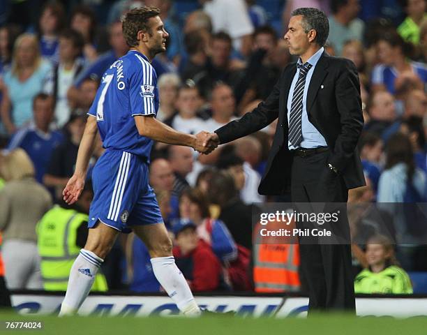 Jose Mourinho manager of Chelsea shakes hands with Andriy Shevchenko following the Barclays Premier League match between Chelsea and Blackburn Rovers...