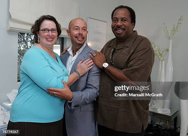 Actress Phyllis Smith, stylist Michael O'Connor, and actor Leslie David Baker pose during the gift lounge held at the Platinum Guild International...