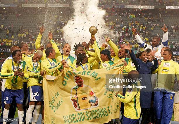 The Mamelodi Sundowns players pose with the Trophy after winning the final during the SAA Supa 8 Final match between the Mamelodi Sundowns and the...