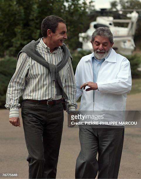 Spanish Prime Minister Jose luis Rodriguez Zapatero chats with Brazilian President Luiz Inacio Lula da Silva at Quintos de Mora ranch near Toledo, 15...