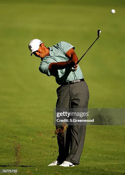 Tiger Woods plays the 16th hole during the third round of the TOUR Championship, the final event of the new PGA TOUR Playoffs for the FedExCup at...
