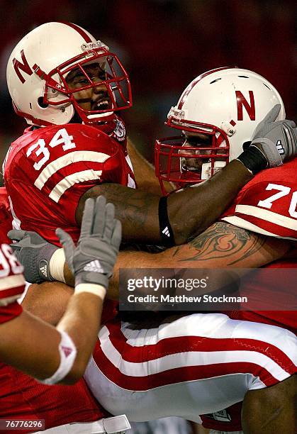 Cody Glenn of the Nebraska Cornhuskers is congratulated by Matt Slauson after scoring a touchdown against the USC Trojans on September 15, 2007 at...