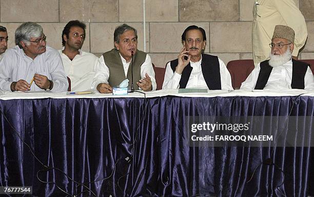 Leaders of the All Parties Democratic Movement Qazi Hussain Ahmed from the hardline Muttahida Majlis-e-Amal , Raja Zafar-ul-Haq and Javed Hashmi from...