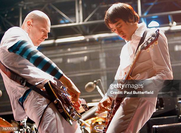 Musicians Billy Corgan and Jeff Schroeder from Smashing Pumpkins perform onstage during KROQ's LA Invasion concert held at the Home Depot Center on...