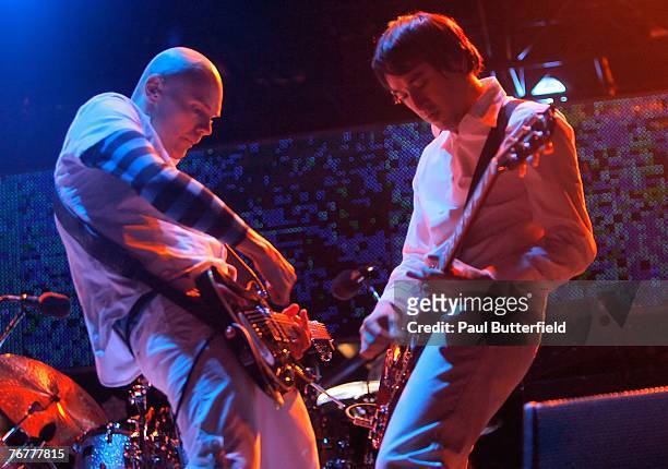 Musicians Billy Corgan and Jeff Schroeder from Smashing Pumpkins perform onstage during KROQ's LA Invasion concert held at the Home Depot Center on...