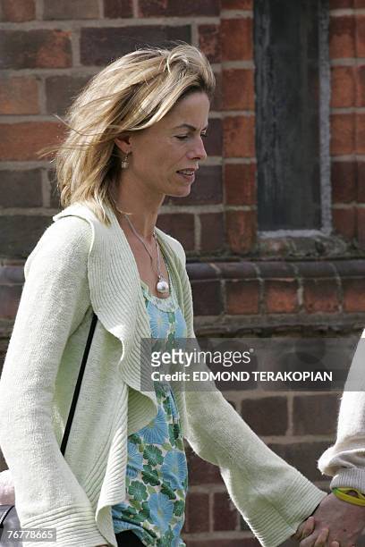 The mother of missing four-year-old British girl Madeleine McCann, Kate, leaves 16 September 2007 the Catholic Church of the Sacred Cross in Rothley,...