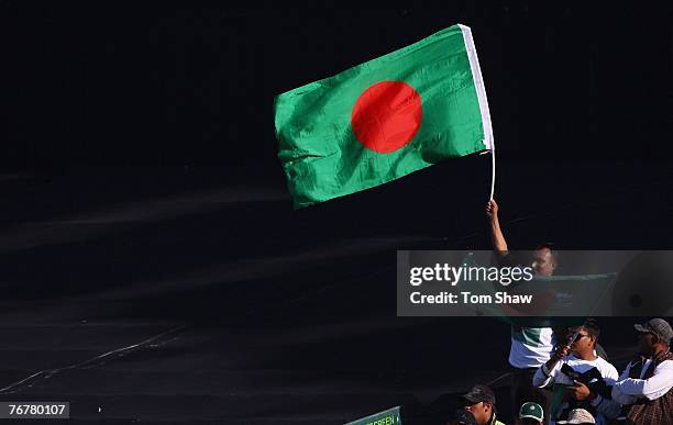 Bangladesh fans wave flags during the Twenty20 Cup Super Eights match between Australia and Bangladesh at Newlands Cricket Ground on September 16,...