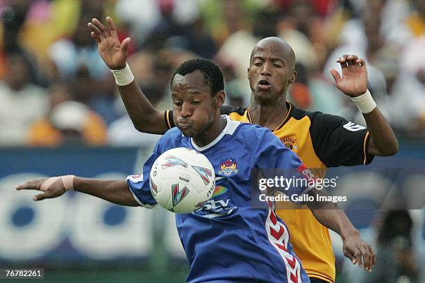 Katlego Mashego of Supersport United and Jimmy Tau of Kaizer Chiefs fight for the ball during a PSL match between Supersport United and Kaizer Chiefs...