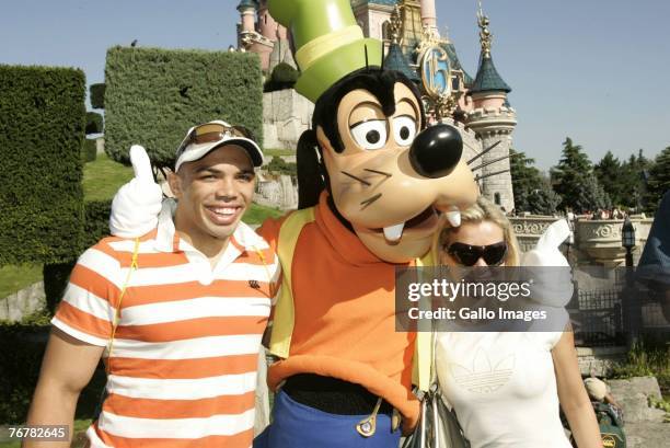 South Africa's Rugby team member Bryan Habana with his friend Janine Viljoen during a visit to Disneyland on September 16, 2007 in Paris, France.