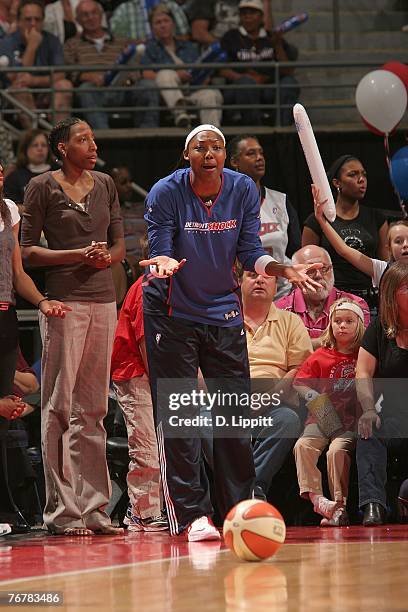 Cheryl Ford of the Detroit Shock looks on from the bench during Game Five of the WNBA Finals against the Phoenix Mercury at The Palace of Auburn...