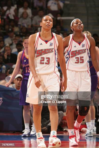 Plenette Pierson and Cheryl Ford of the Detroit Shock walk back to the bench during a timeout in Game Five of the WNBA Finals against the Phoenix...