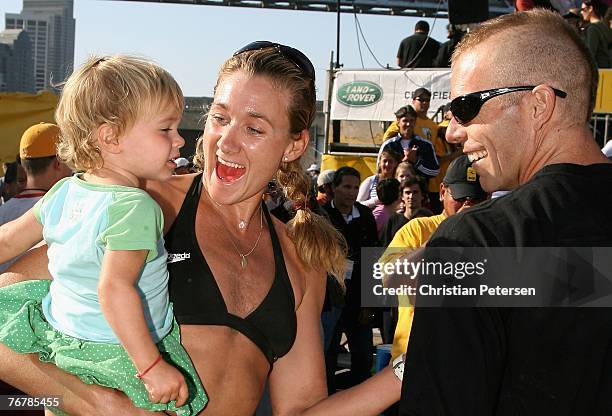 Kerri Walsh celebrates with her niece and husband Casey Jennings after the AVP San Francisco Best of the Beach Open final match at Pier 30/32 on...