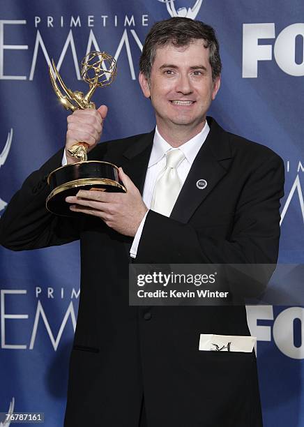 Writer Greg Daniels pose in the pressroom with his Emmy for "Outstanding Writing in a Comedy Series" for "The Office" during the 59th Annual...