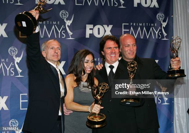 Director Rob Marshall and the producers of "Tony Bennett: An American Classic" pose in the press room with their Emmy for "Outstanding Variety, Music...