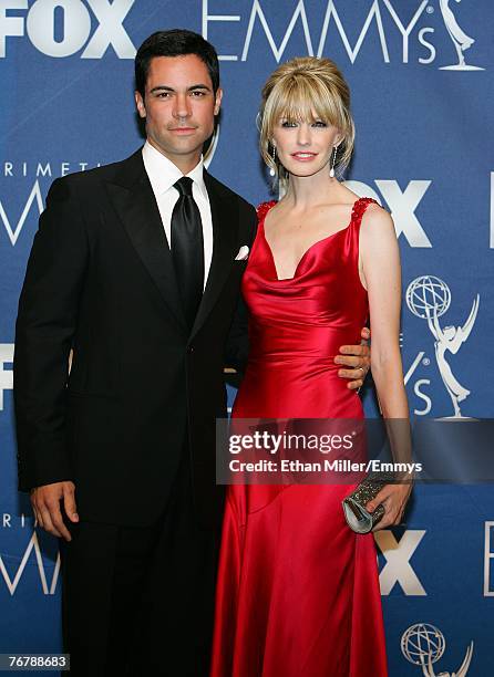 Actors Danny Pino and Kathryn Morris pose in the press room during the 59th Annual Primetime Emmy Awards at the Shrine Auditorium on September 16,...