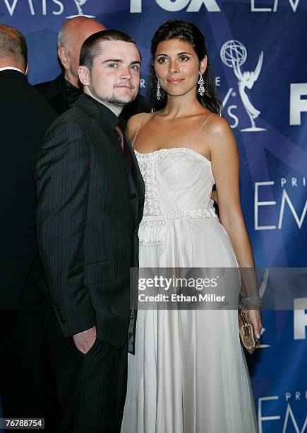 Actors Robert Iler and Jamie-Lynn Sigler pose in the press room after their win for "Outstanding Drama Series" for "The Sopranos" during the 59th...