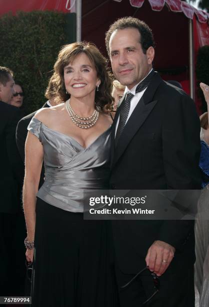 Actor Tony Shalhoub and wife/actress Brooke Adams arrive at the 59th Annual Primetime Emmy Awards at the Shrine Auditorium on September 16, 2007 in...