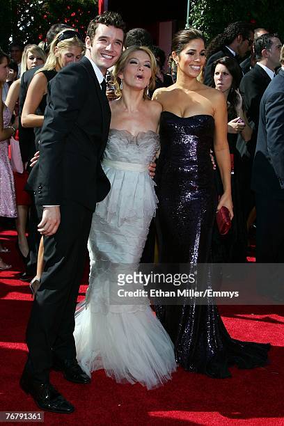 Actors Michael Urie, Becki Newton, and Ana Ortiz arrive at the 59th Annual Primetime Emmy Awards at the Shrine Auditorium on September 16, 2007 in...