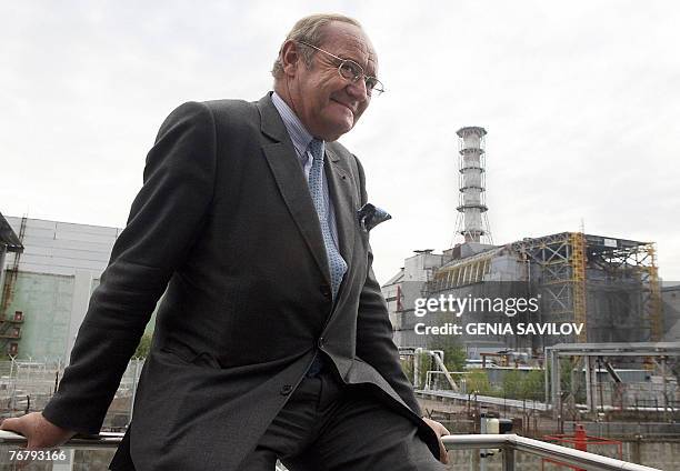 President Yves Thibault De Silguy stands in front of Sarkophagus over fourth block of Chernobyl nuclear Power Plant, 17 September 2007. French...