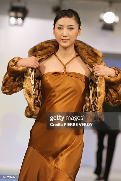 Model presents a creation of Chinese company Ellassay during the China Textile And Apparel Trade Fair , the 17 September 2007 in Le Bourget, northern...